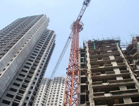 Construction site likely associated with Puravankara Limited, showing building framework and development activity.