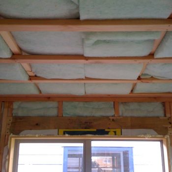13-higgins-insulation-polyester-insulation-batts-installed-wooden frame